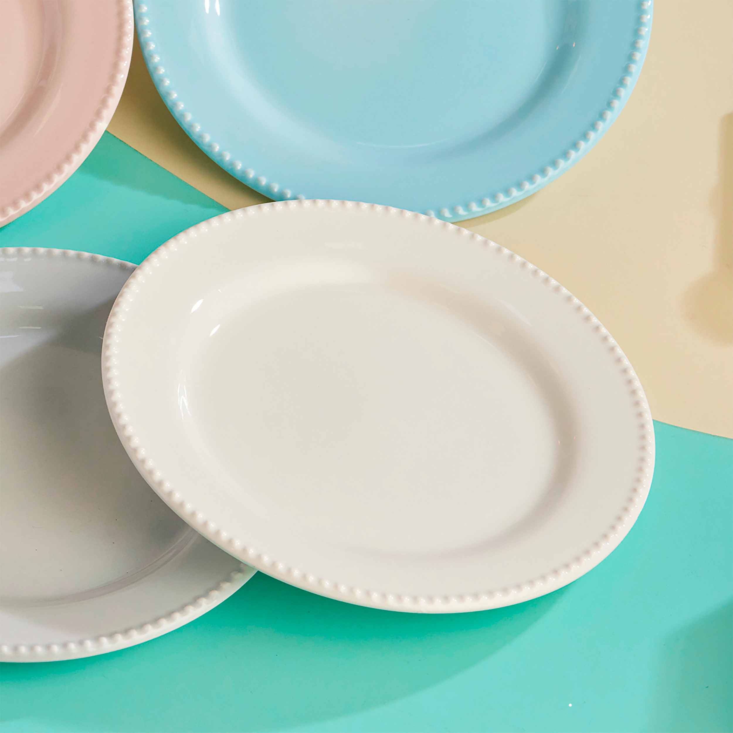 SET 4 PLATOS PANDOS 24.3CM PERLA SURTIDO CORONA